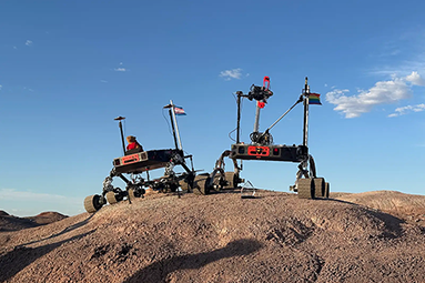 NEU mars rover team two rovers in the desert