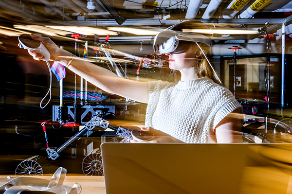 student wearing virtual reality glasses