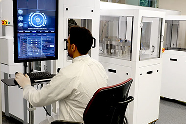 Northeastern student, Ahmed Hafez Abdelaziz, working at a computer in a lab