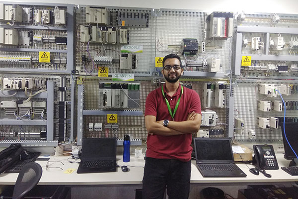 Vatsal Prakash, ME’20, MS in engineering management, in the Level 2 Technical Support lab while on co-op at Schneider Electric in India.